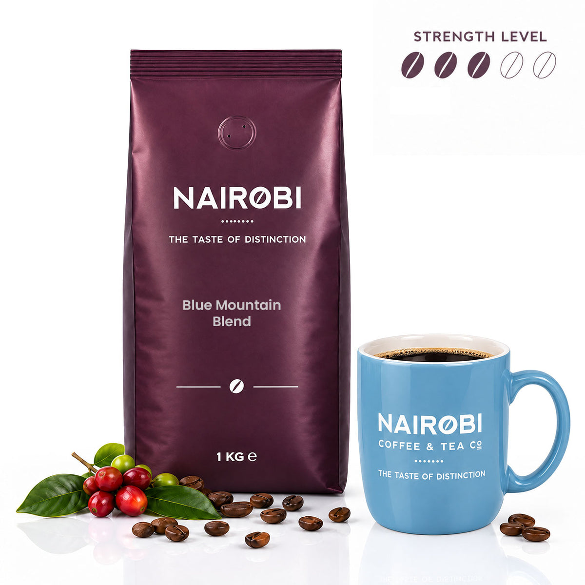 Nairobi Coffee Blue Mountain Blend 1kg coffee beans beside a blue mug, roasted beans and coffee cherries